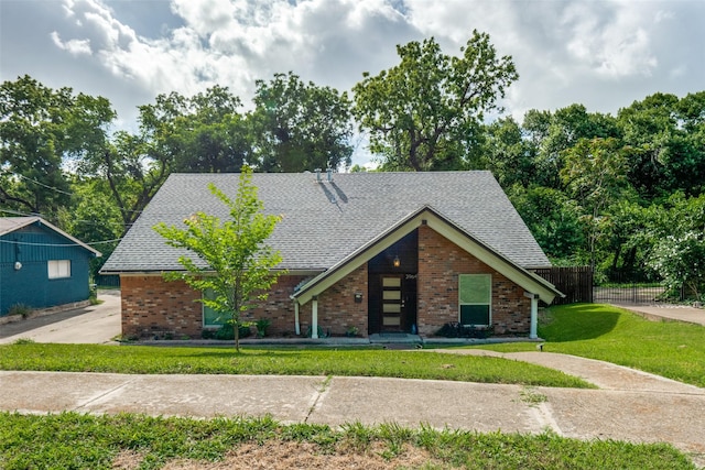 3964 Lost Creek Dr, Dallas, TX 75224 - view of front facade with a shingled roof and brick siding