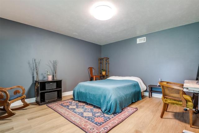 3964 Lost Creek Dr, Dallas, TX 75224 - bedroom with wood finished floors and baseboards