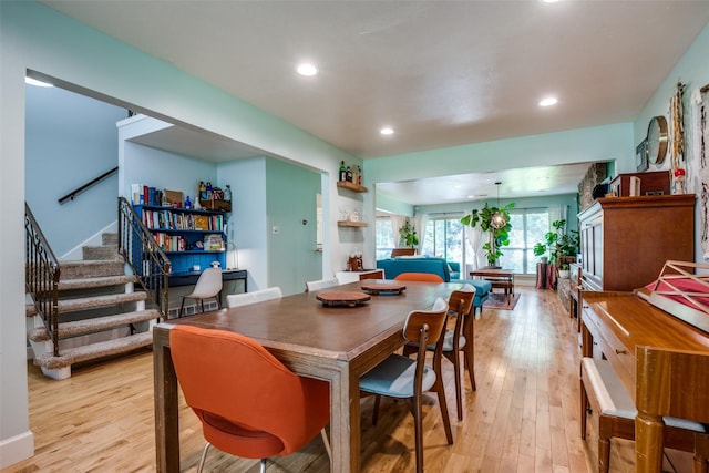 3964 Lost Creek Dr, Dallas, TX 75224 - dining space featuring light wood-style flooring, stairway, and recessed lighting