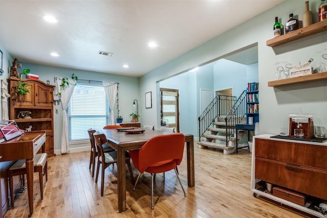 3964 Lost Creek Dr, Dallas, TX 75224 - dining room featuring light wood-style floors, stairway, and recessed lighting