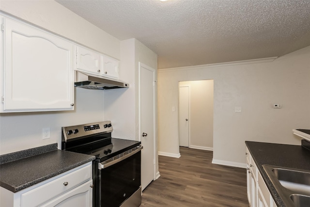 1421 Monica Ct, Mesquite, TX 75149 - kitchen featuring under cabinet range hood, stainless steel electric range oven, dark countertops, white cabinets, and dark wood-style flooring