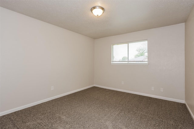 1421 Monica Ct, Mesquite, TX 75149 - unfurnished room featuring carpet, baseboards, and a textured ceiling