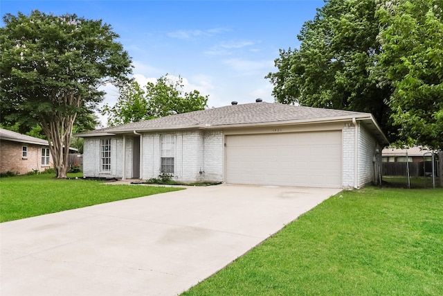 1421 Monica Ct, Mesquite, TX 75149 - single story home with brick siding, driveway, an attached garage, and roof with shingles