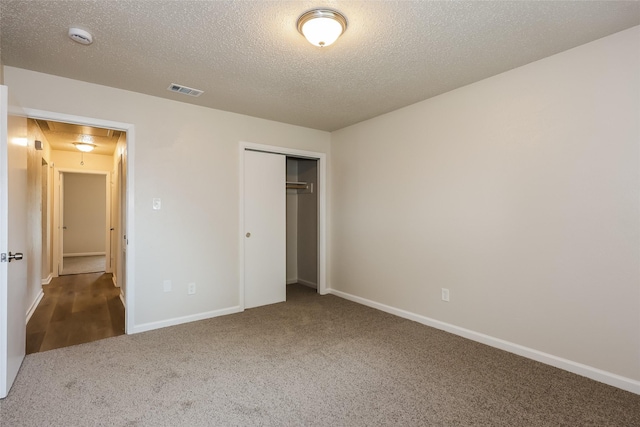 1421 Monica Ct, Mesquite, TX 75149 - unfurnished bedroom with attic access, carpet flooring, a textured ceiling, a closet, and baseboards