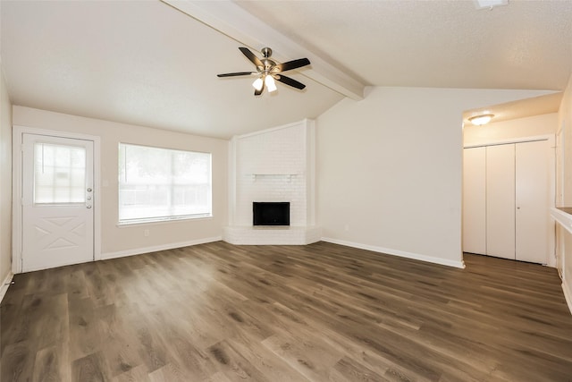 1421 Monica Ct, Mesquite, TX 75149 - unfurnished living room with ceiling fan, wood finished floors, baseboards, and a brick fireplace