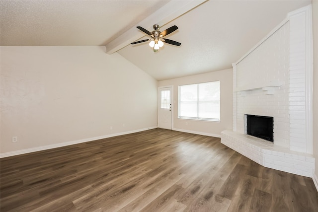 1421 Monica Ct, Mesquite, TX 75149 - unfurnished living room featuring a ceiling fan, dark wood finished floors, baseboards, and a brick fireplace