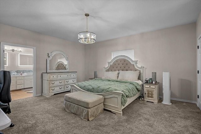 114 Deer Run, Moody, TX 76557 - carpeted bedroom featuring a chandelier, a desk, and connected bathroom