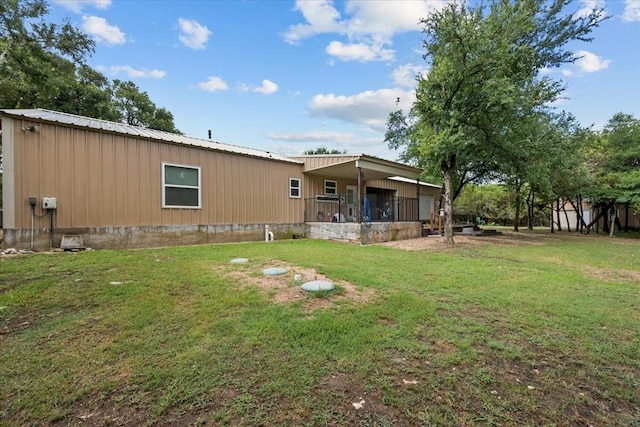 114 Deer Run, Moody, TX 76557 - back of property with a yard and metal roof