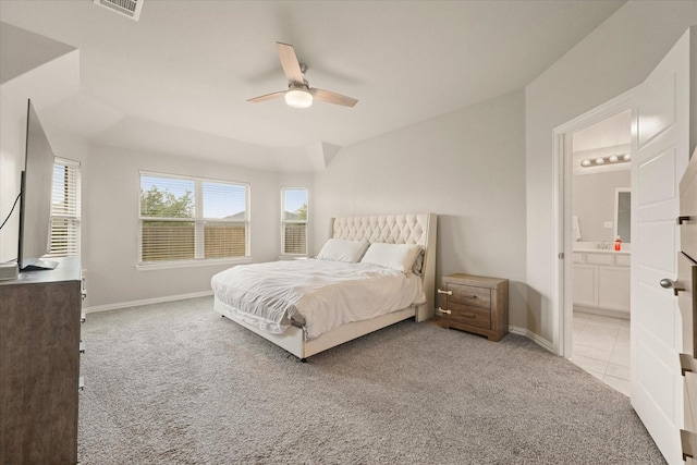 2205 Perrymead Dr, Forney, TX 75126 - bedroom featuring carpet, multiple windows, lofted ceiling, ensuite bathroom, and a ceiling fan