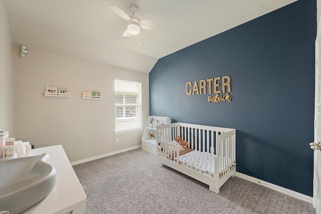 2205 Perrymead Dr, Forney, TX 75126 - carpeted bedroom featuring a crib, vaulted ceiling, and a ceiling fan