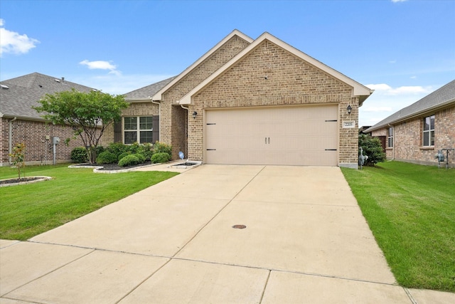 2205 Perrymead Dr, Forney, TX 75126 - ranch-style home featuring brick siding, a front yard, a garage, and concrete driveway