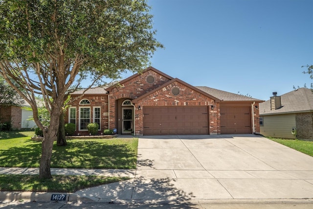 14137 Playa Trl, Fort Worth, TX 76052 - view of front facade with an attached garage, a front lawn, brick siding, and concrete driveway