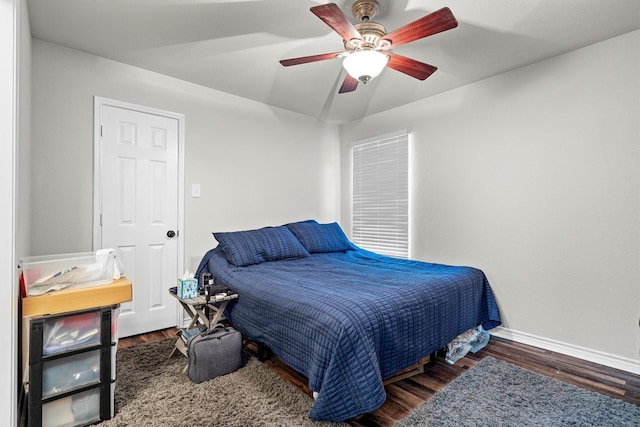 14137 Playa Trl, Fort Worth, TX 76052 - bedroom with wood finished floors, baseboards, and a ceiling fan