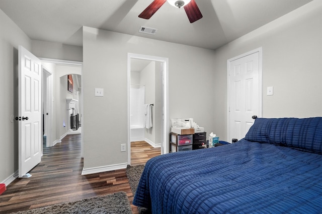 14137 Playa Trl, Fort Worth, TX 76052 - bedroom with wood finished floors, arched walkways, baseboards, and a ceiling fan