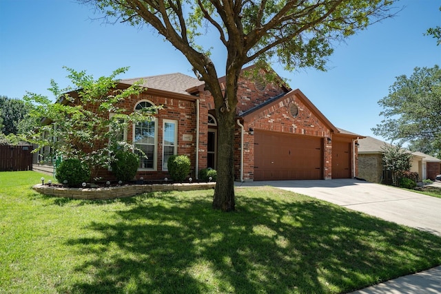 14137 Playa Trl, Fort Worth, TX 76052 - traditional-style house with a garage, brick siding, driveway, and a shingled roof