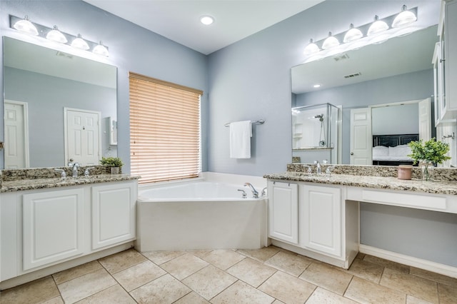 11543 Las Polamas Dr, Frisco, TX 75033 - bathroom with a stall shower, a bath, two vanities, and ensuite bathroom