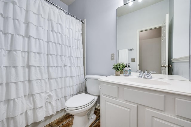 11543 Las Polamas Dr, Frisco, TX 75033 - bathroom featuring toilet, vanity, and curtained shower