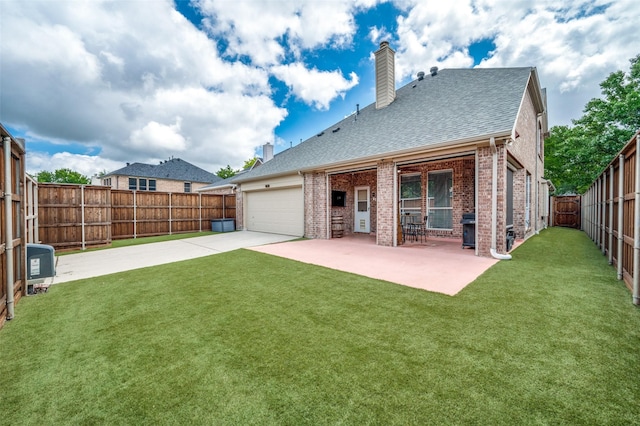 11543 Las Polamas Dr, Frisco, TX 75033 - rear view of house with brick siding, a chimney, roof with shingles, driveway, and a garage
