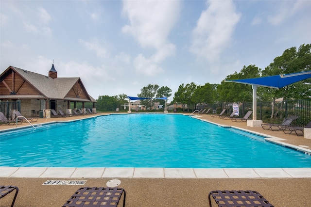 11543 Las Polamas Dr, Frisco, TX 75033 - community pool featuring a patio area