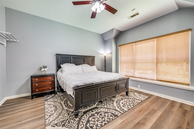 11543 Las Polamas Dr, Frisco, TX 75033 - bedroom featuring vaulted ceiling, light wood-style floors, baseboards, and ceiling fan