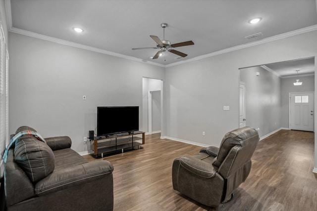 2939 Meadow Brook Trl, Tyler, TX 75701 - living area featuring ceiling fan, wood finished floors, baseboards, recessed lighting, and crown molding