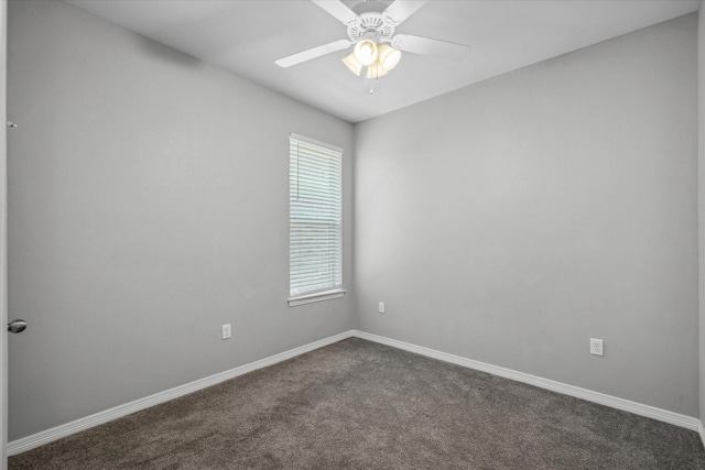 2939 Meadow Brook Trl, Tyler, TX 75701 - empty room with dark colored carpet, baseboards, and ceiling fan