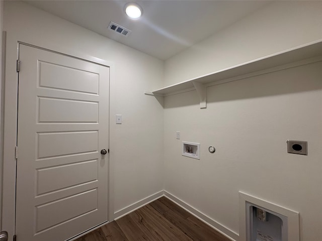 4049 Rimfire Rd, Waco, TX 76705 - laundry room featuring electric dryer hookup, baseboards, dark wood-type flooring, hookup for a washing machine, and gas dryer hookup