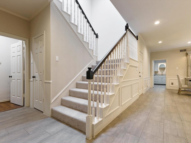 7 Duncannon Ct, Dallas, TX 75225 - stairs with ornamental molding, recessed lighting, and a decorative wall