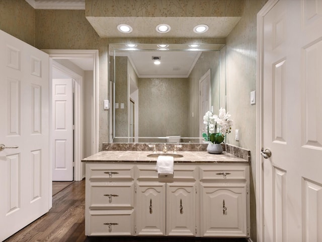 7 Duncannon Ct, Dallas, TX 75225 - bathroom with vanity, wallpapered walls, wood finished floors, and crown molding