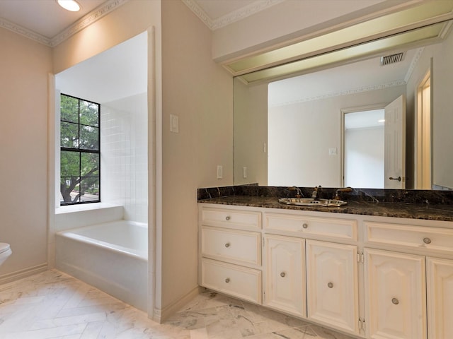 7 Duncannon Ct, Dallas, TX 75225 - bathroom with marble finish floors, baseboards, toilet, vanity, and a bath