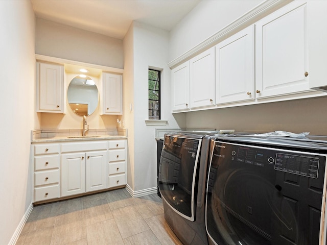 7 Duncannon Ct, Dallas, TX 75225 - washroom featuring separate washer and dryer, cabinet space, and baseboards
