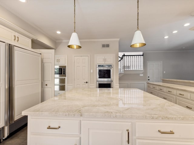 7 Duncannon Ct, Dallas, TX 75225 - kitchen with built in appliances, ornamental molding, a center island, light stone counters, and recessed lighting