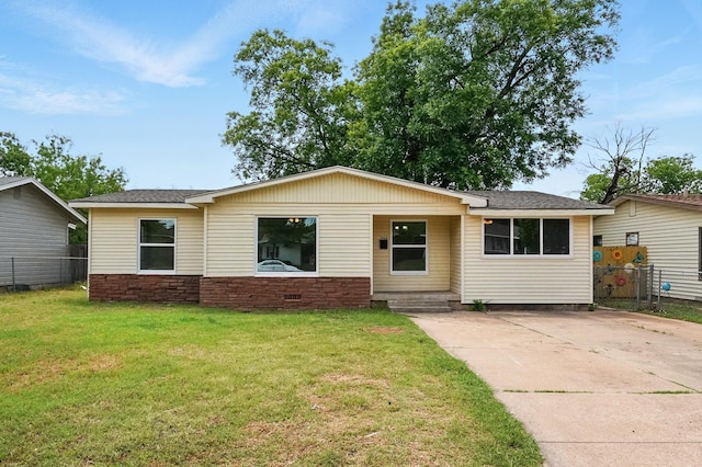 1942 Woodard St, Abilene, TX 79605 - ranch-style home with concrete driveway and a shingled roof