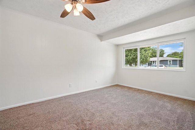 1942 Woodard St, Abilene, TX 79605 - spare room featuring ceiling fan, carpet flooring, baseboards, and a textured ceiling