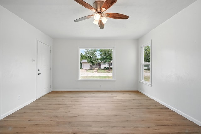 1942 Woodard St, Abilene, TX 79605 - spare room featuring light wood-style flooring, ceiling fan, and baseboards