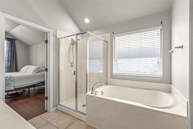 1917 Winter Hawk Dr, Fort Worth, TX 76177 - bathroom featuring vaulted ceiling, a garden tub, connected bathroom, a stall shower, and tile patterned flooring