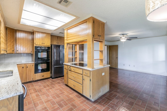 1604 Oak Hollow Dr, Woodway, TX 76712 - kitchen with black appliances, brick patterned flooring, ceiling fan, and baseboards