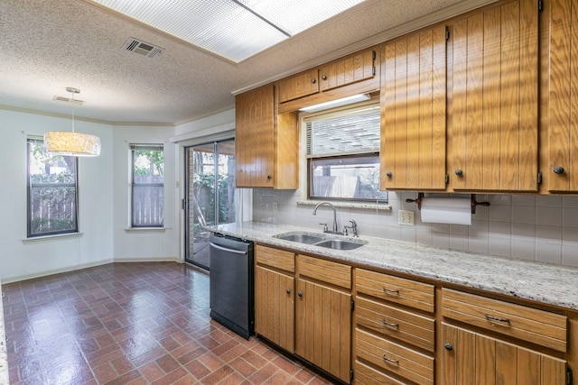 1604 Oak Hollow Dr, Woodway, TX 76712 - kitchen with a sink, dishwashing machine, tasteful backsplash, baseboards, and a textured ceiling