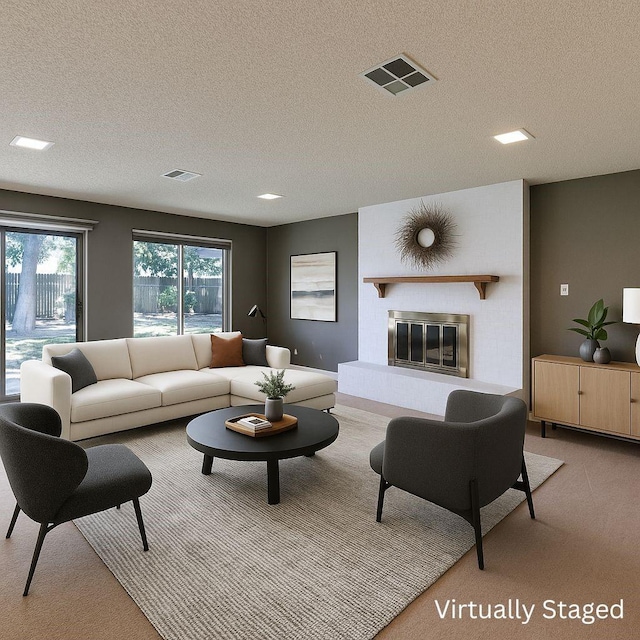 1604 Oak Hollow Dr, Woodway, TX 76712 - living area with light colored carpet, a textured ceiling, and a brick fireplace