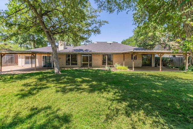 1604 Oak Hollow Dr, Woodway, TX 76712 - rear view of property with a patio area, a chimney, and brick siding