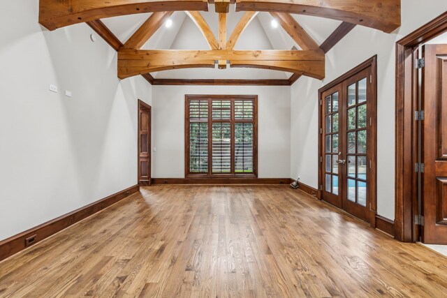 44 Armstrong Dr, Frisco, TX 75034 - spare room with french doors, wood finished floors, and baseboards