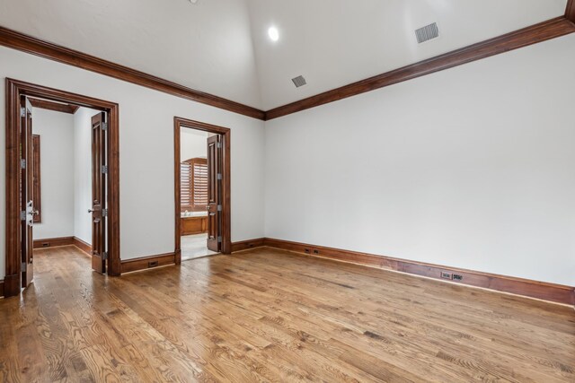 44 Armstrong Dr, Frisco, TX 75034 - empty room with light wood-type flooring, baseboards, high vaulted ceiling, and ornamental molding