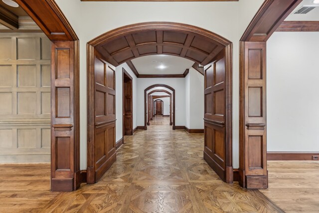 44 Armstrong Dr, Frisco, TX 75034 - corridor featuring arched walkways, crown molding, and baseboards