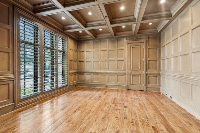 44 Armstrong Dr, Frisco, TX 75034 - empty room featuring a decorative wall, recessed lighting, coffered ceiling, crown molding, and light wood finished floors