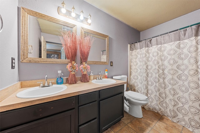 1012 Hatton St, Waco, TX 76704 - bathroom featuring toilet and double vanity
