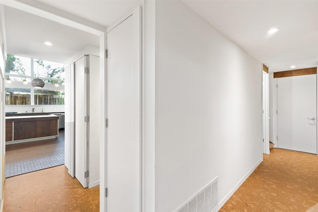 1703 E Barbara St, Tyler, TX 75701 - hallway with recessed lighting