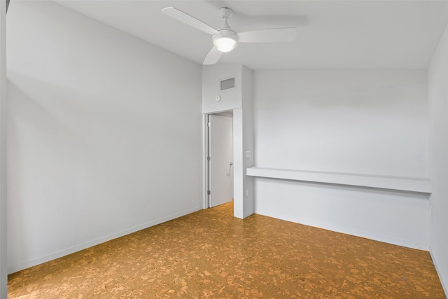 1703 E Barbara St, Tyler, TX 75701 - empty room featuring a ceiling fan and baseboards