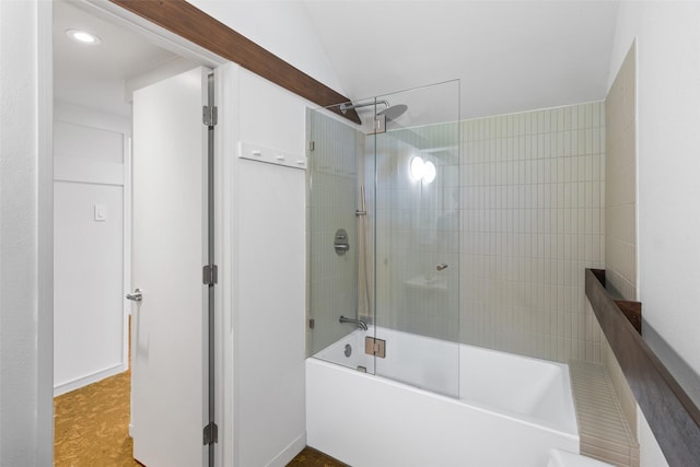 1703 E Barbara St, Tyler, TX 75701 - bathroom with  shower combination and vaulted ceiling