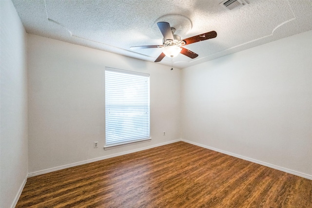 2505 Blue Quail Dr, Arlington, TX 76017 - spare room with a textured ceiling, ceiling fan, wood finished floors, and baseboards