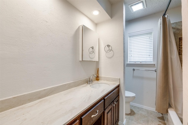 2505 Blue Quail Dr, Arlington, TX 76017 - bathroom with vanity, toilet, tile patterned floors, baseboard heating, and baseboards